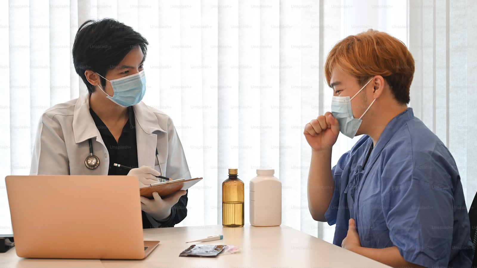 Doctor consulting a patient in clinic